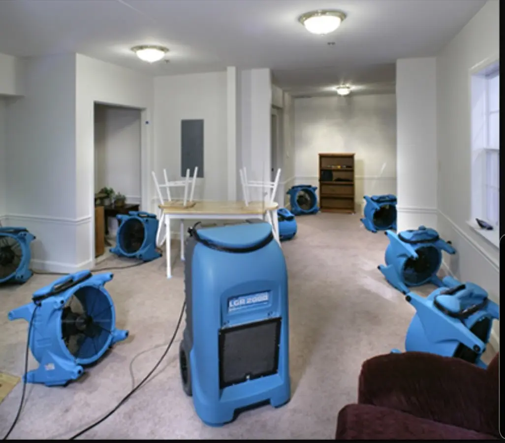 Air movers and dehumidifier setup for Water Damage Restoration in Princeton